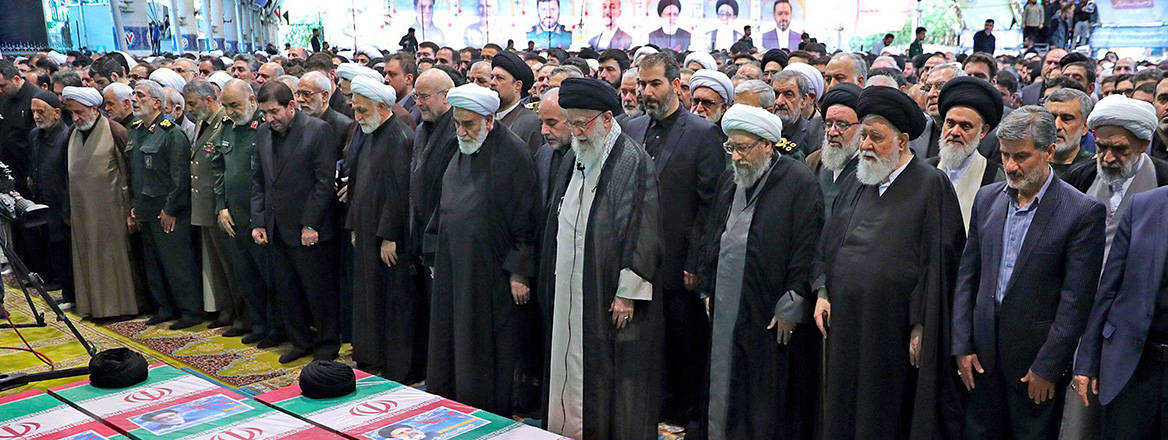 Heads bowed: Iran's Supreme Leader Ali Khamenei leads a funeral prayer for the late President Ebrahim Raisi and other officials killed in the recent helicopter crash