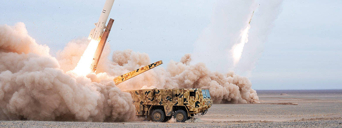 Taking aim: Iranian launchers firing medium-range ballistic missiles