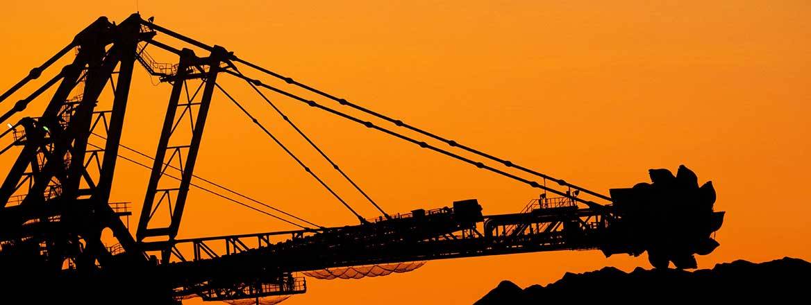 Sunset over Iron Ore mining machinery in Port Hedland Western Australia