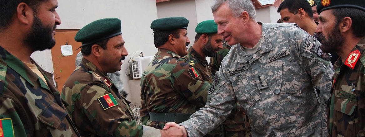 General David McKiernan, former ISAF commander, meeting with Afghan National Army soldiers in 2009