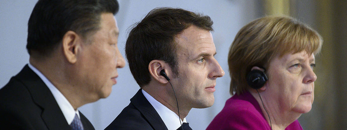 Chinese President Xi Jinping, French President Emmanuel Macron and German Chancellor Angela Merkel during a press conference in Paris in March 2019