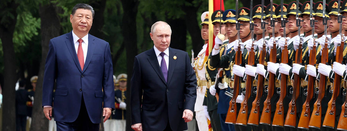 Unequal partnership: Chinese President Xi Jinping welcomes Russian President Vladimir Putin on his state visit to Beijing on 16 May