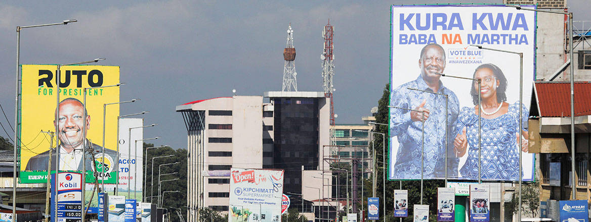 Kenya's choice: banners of rival presidential candidates on display in Kericho, Kenya