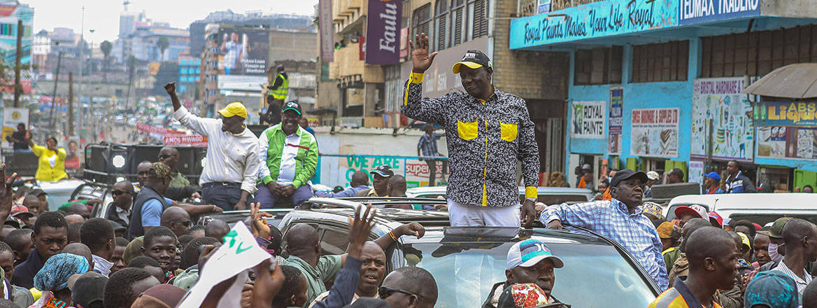 Positive signs: Deputy President and United Democratic Alliance presidential candidate William Ruto waves to the public during a campaign tour in Nairobi