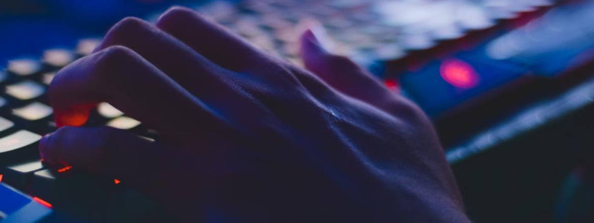 close up fingers on keyboard