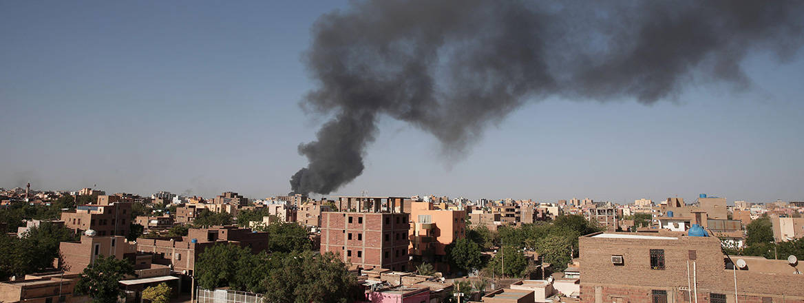 Plunged into chaos: smoke is seen rising from the Sudanese capital of Khartoum on 19 April 2023 as fighting intensifies