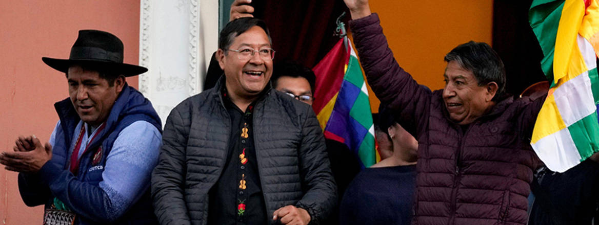 Image of defiance: Bolivian President Luis Arce, accompanied by his vice president, acknowledges supporters on 26 June 2024 in the aftermath of the alleged coup attempt