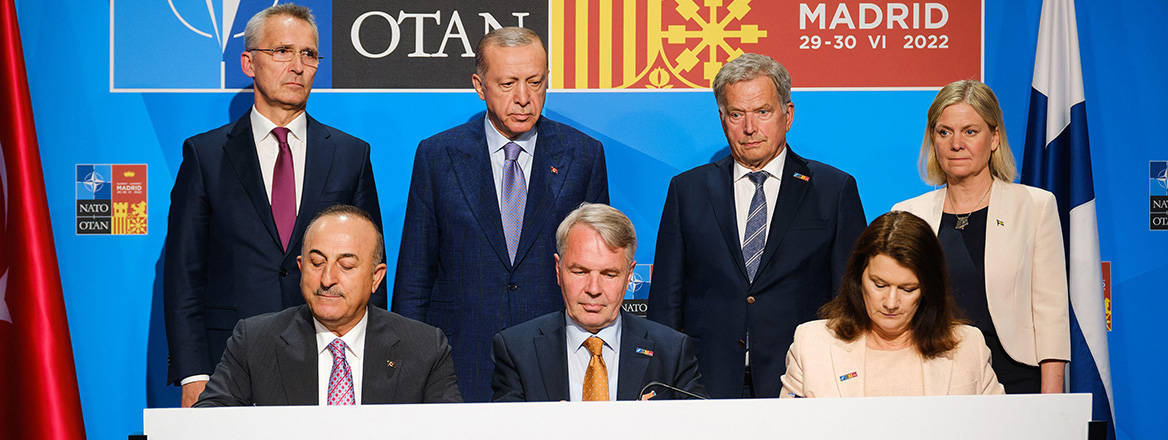 Baby steps: the foreign ministers of Turkey, Finland and Sweden sign a Memorandum of Understanding at the NATO Madrid Summit in June 2022