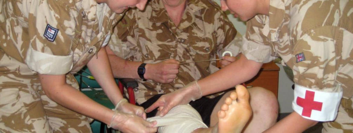 nurses attend to wounded soldier