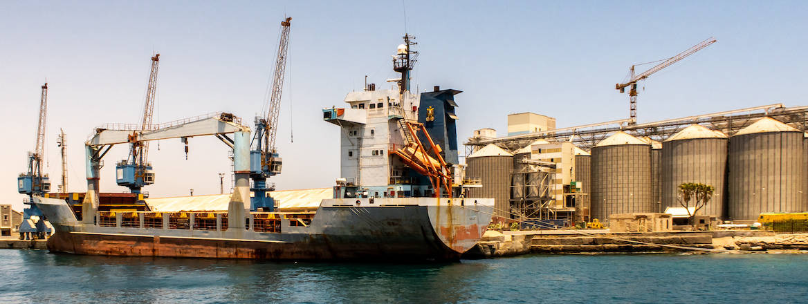 A ship being loaded in Port Sudan, where Russia aims to build a naval base.