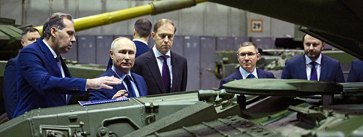 Russian President Vladimir Putin visits a tank factory in February 2024