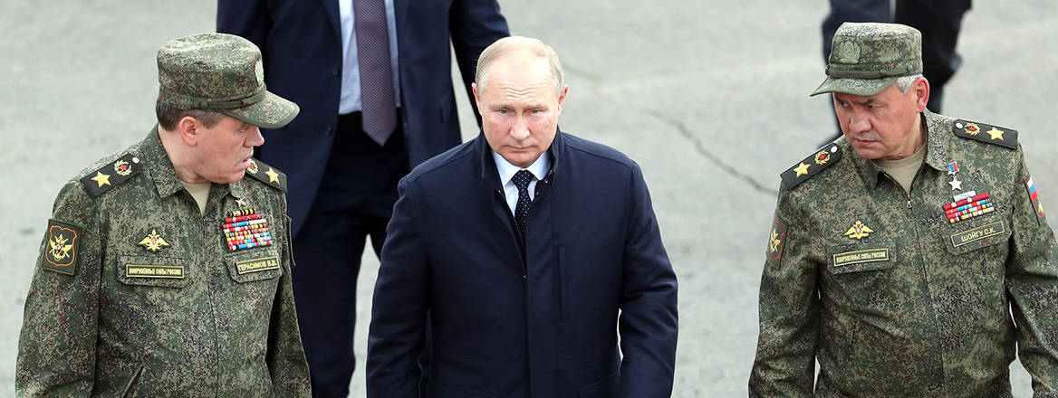 Changes afoot: Vladimir Putin with his Chief of General Staff Valeriy Gerasimov and Defence Minister Sergei Shoigu