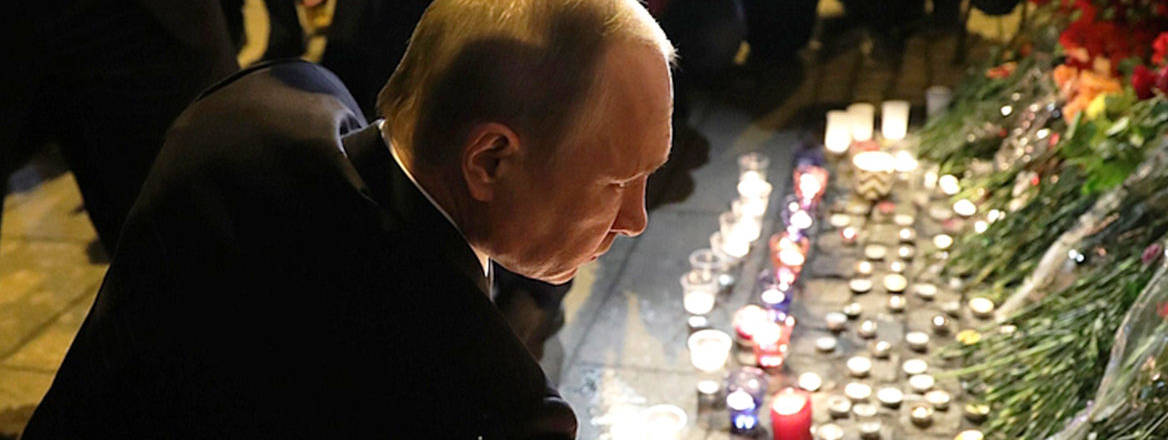 Russian President Vladimir Putin visits a memorial