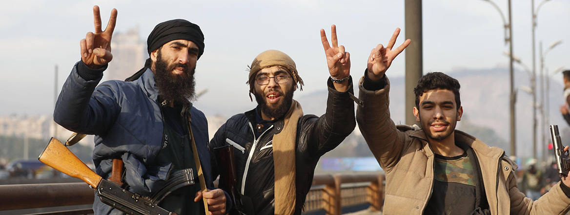 Long-awaited moment: rebel fighters celebrate the capture of Damascus on 8 December 2024