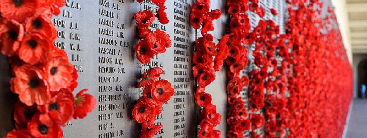 War memorial with poppies