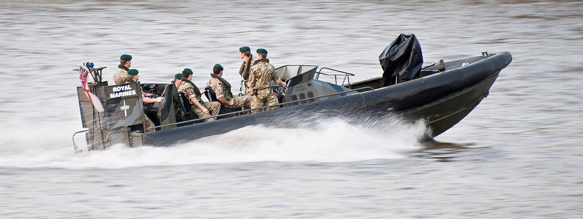 Royal Marines in a speedboat on the River Thames