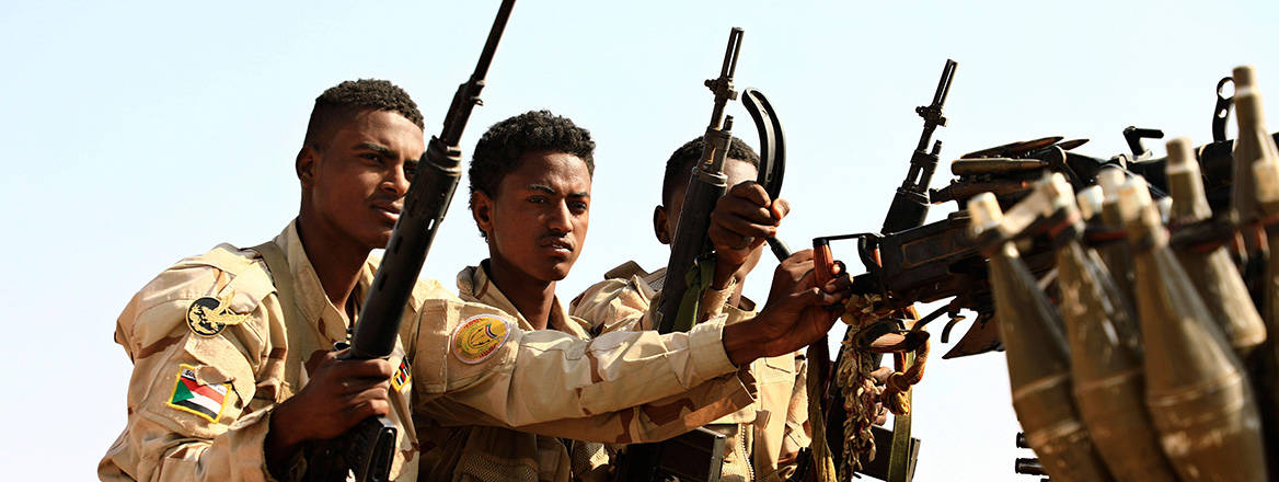 Guns at the ready: Sudanese soldiers from the Rapid Support Forces, one of the rival factions fighting for power