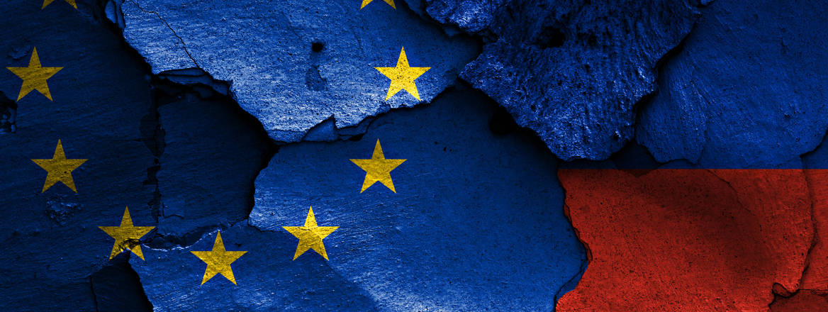 Russian and EU flags on a cracked background