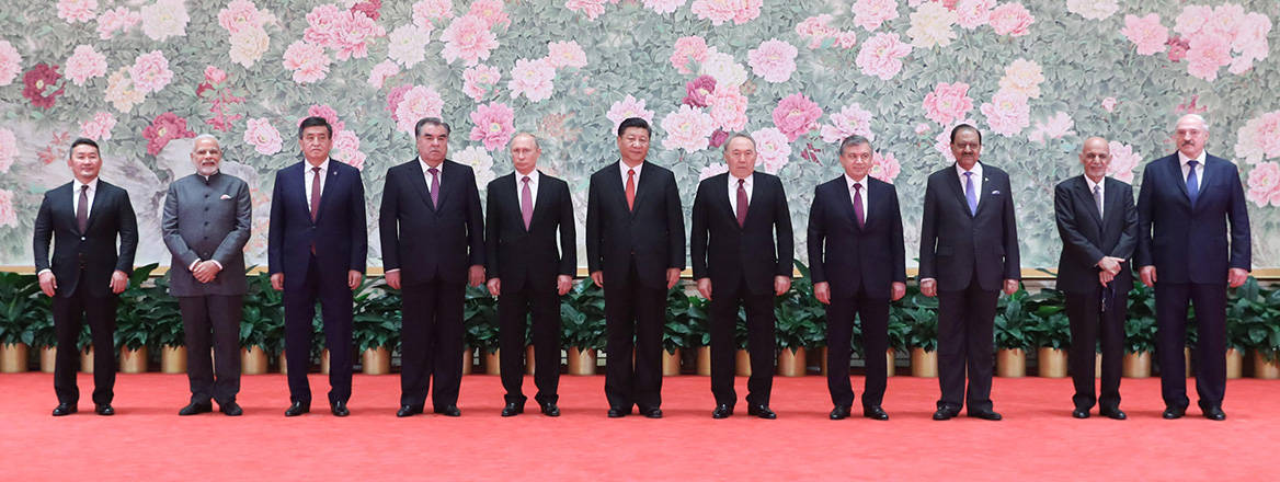 Leaders attending the 18th Shanghai Cooperation Organisation (SCO) summit in Qingdao, China in June 2018 pose for a group photo