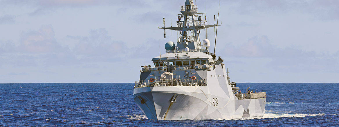 HMS Spey in open sea.