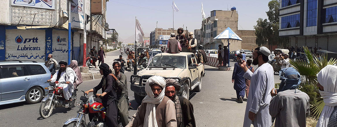 Taliban fighters enter Kandahar, southern Afghanistan, on 13 August 2021. Courtesy of Xinhua/Alamy Stock Photo