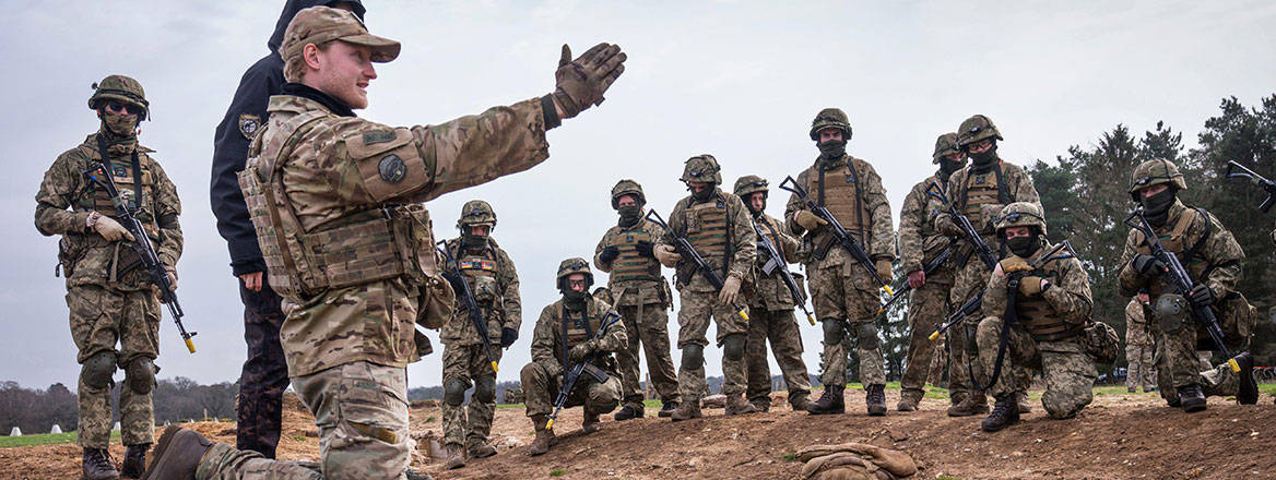 Helping hand: Danish instructors train Ukrainian recruits in an area of eastern England in March 2024
