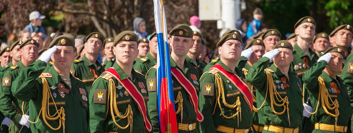 Saluting the motherland: troops of the Operational Group of Russian Forces in Transnistria pictured on Victory Day in Tiraspol in 2017