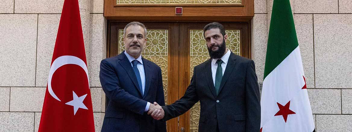 Beyond the handshake: The complex relationship between Turkey and Syria. Turkish Foreign Minister Hakan Fidan, left, shakes hands with Ahmad al-Sharaa, in Damascus, Syria Turkish Foreign Minister Hakan Fidan, left, shakes hands with Ahmad al-Sharaa, in Damascus, Syria
