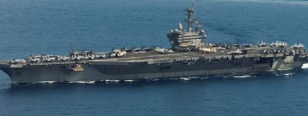 USS George H W Bush transits the Mediterranean Sea while performing flight operations
