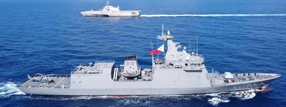 Strategic realignment: USS Gabrielle Giffords and Philippine Navy vessel BRP Jose Rizal pictured during a joint exercise on 23 November 2023