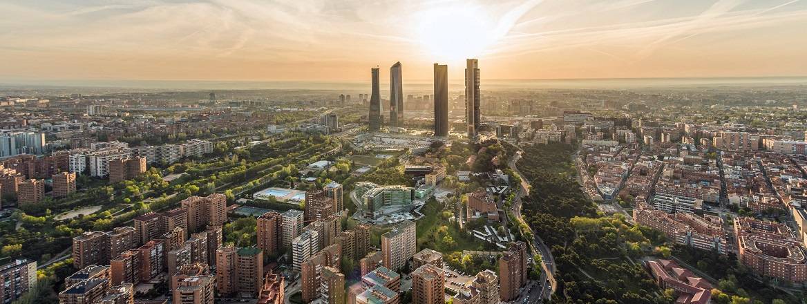 Aerial view of Madrid at sunrise facing the Cuatro Torres Business Area