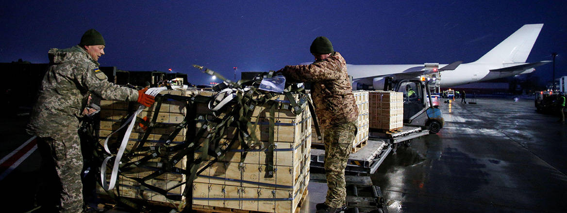 Ukrainian troops unloading supplies