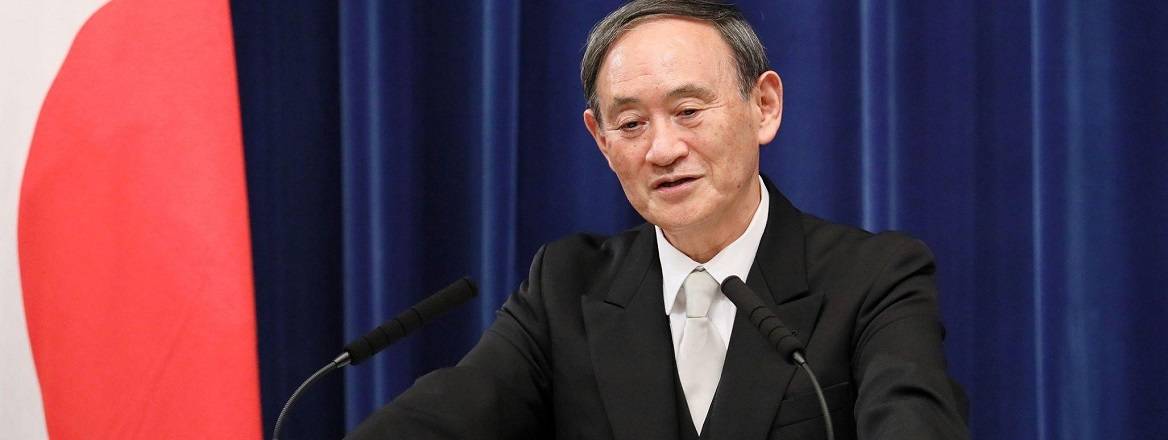 Yoshihide Suga during his first press conference as prime minister of Japan