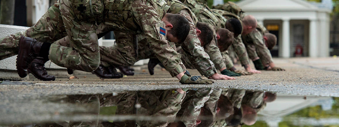 Grenadier Guards enjoying physical training, taking place at Wellington Barracks.