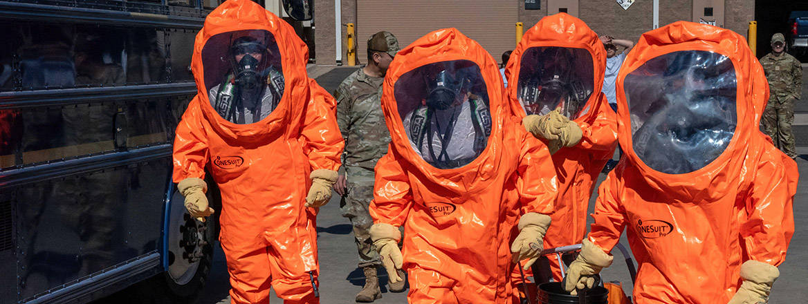 CBRNE airmen walk in their Level A suits at Goldwater Air National Guard base, Phoenix. 