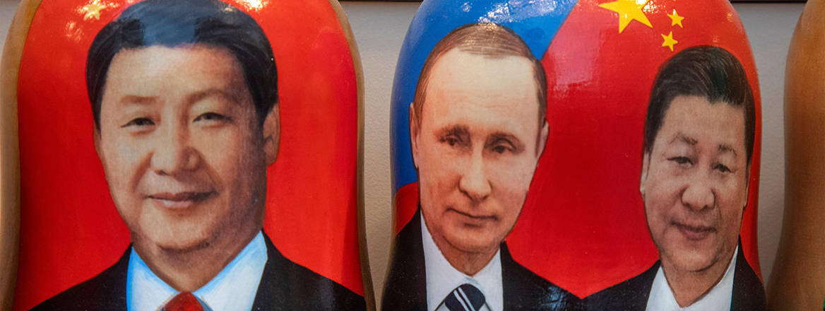 Portraits of leaders Xi Jinping and Vladimir Putin are depicted on matryoshka dolls that are seen on a counter of a souvenir shop in the centre of Moscow, Russia, 14 April, 2024.