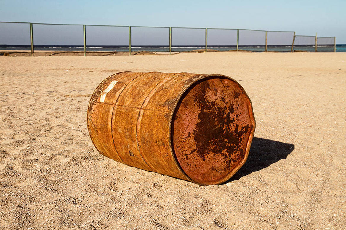 An empty oil barrel.