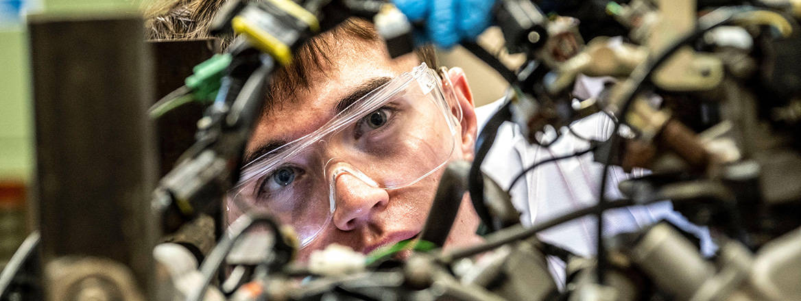An engineering student in a workshop laboratory in Glasgow.