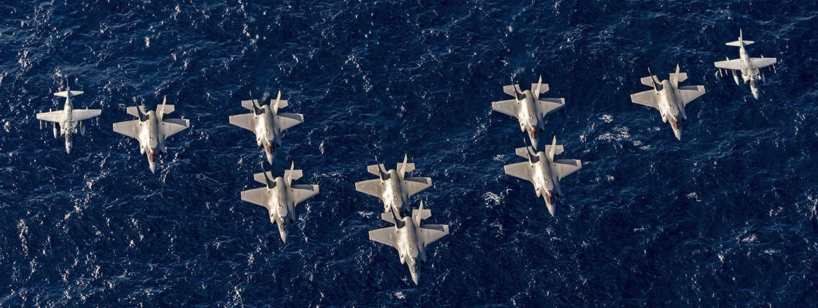 Italian and British F-35B Jets and Italian Navy AV-8B Harrier II Jets fly over UK Flagship, HMS Prince of Wales and Italian aircraft carrier, ITS Cavour, after conducting Exercise NEPTUNE STRIKE.
