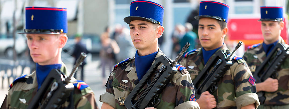 Soldiers in the French military attending parade and marching in Pau in the Pyrenees, France.