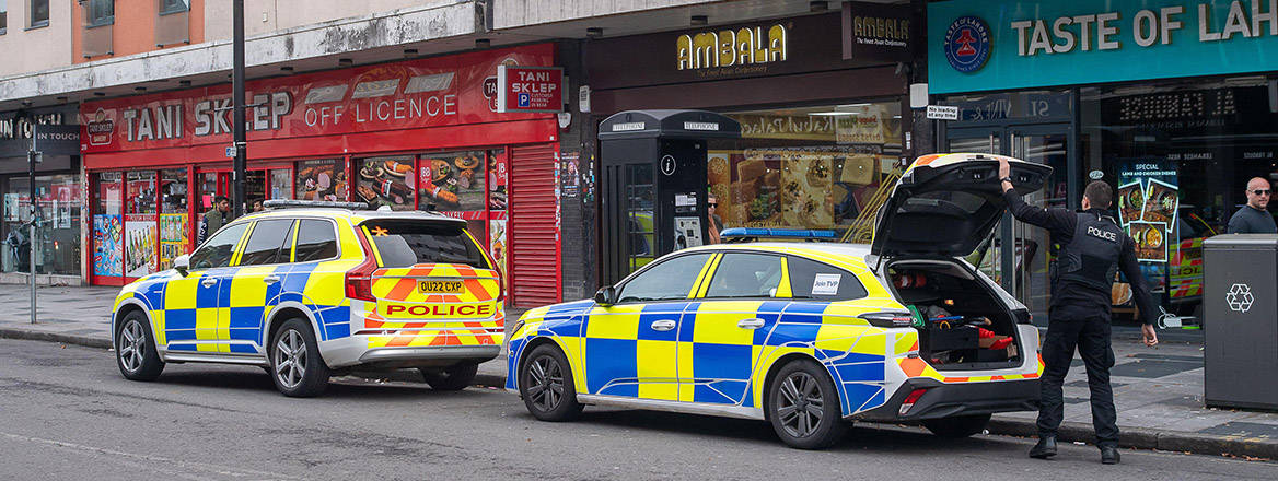 Thames Valley Police on a raid in Slough High Street.