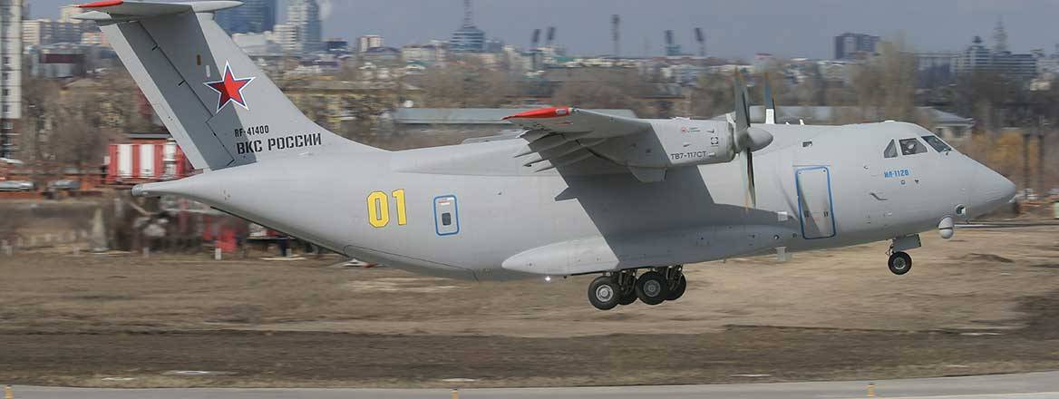 An Il-112V in flight just above the runway