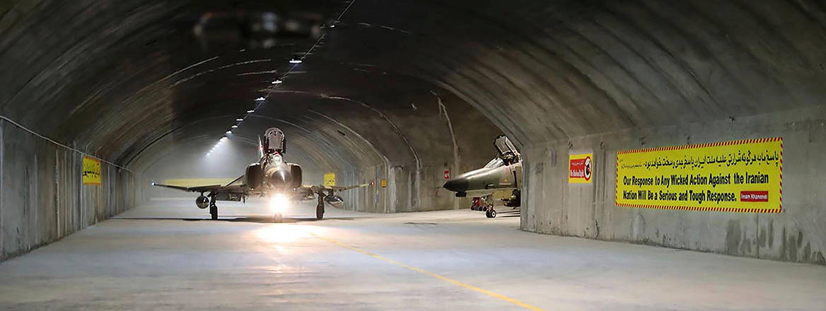 A fighter jet taxis into a Oghab-44 underground airbase, in an undisclosed location in Iran.