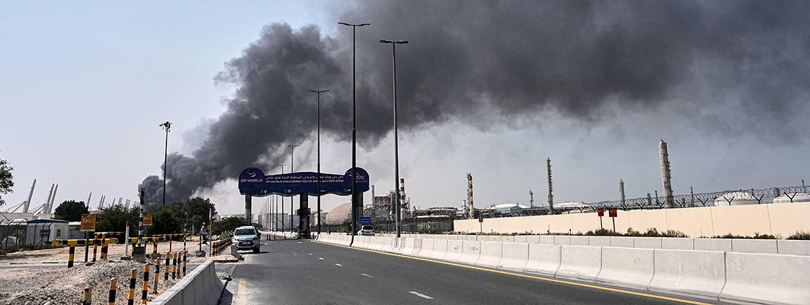 Smoke rises after an Iranian drone attack in the port area of Dubai, United Arab Emirates, Sunday, March 1, 2026.