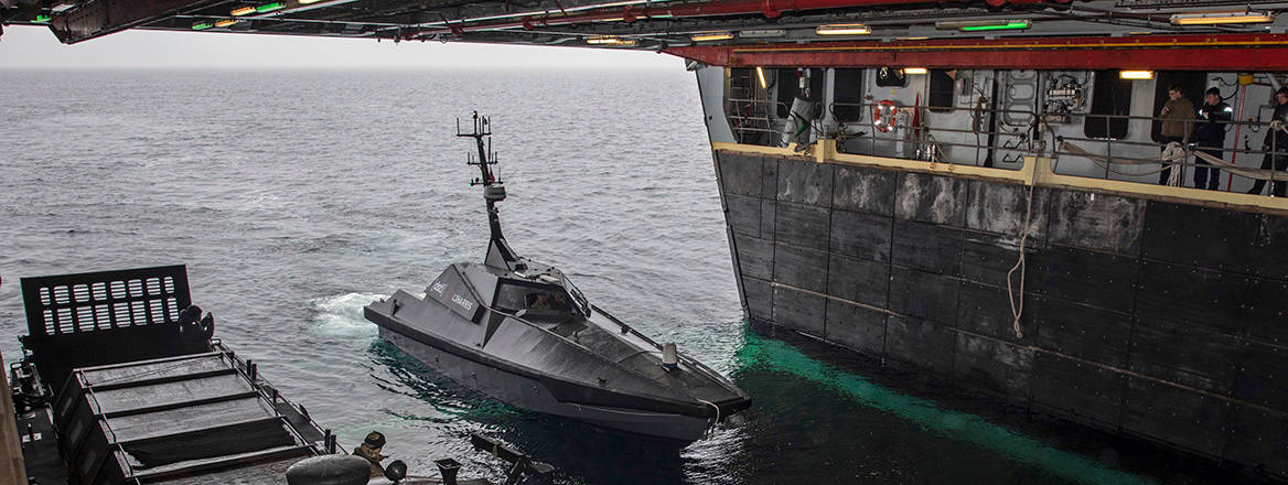 Madfox ASV entering the loading dock of HMS Albion.