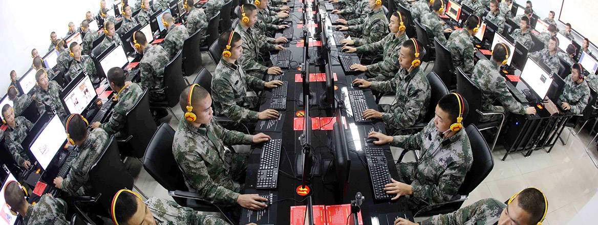 Chinese soldiers use desktop computers at a garrison of the PLA in Chongqing, China,.