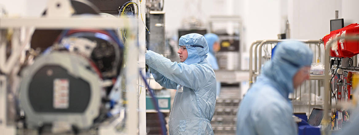 Workers during a visit by the Prince of Wales to the newly opened facility of international semiconductor company KLA in Newport.