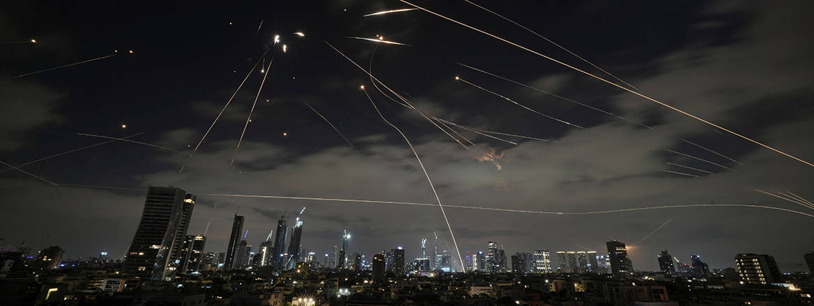 Israeli air defences fire to intercept missiles during an Iranian attack over Tel Aviv, Israel, Sunday, June 15, 2025. 
