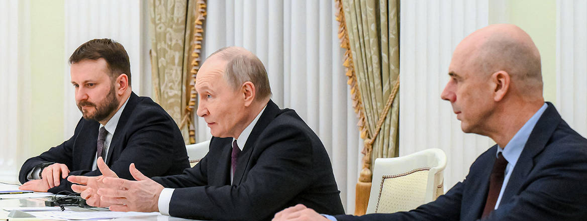 Russian President Vladimir Putin, Deputy Chief of Staff of the Presidential Executive Office Maxim Oreshkin and Russian Finance Minister Anton Siluanov at the Kremlin in Moscow.