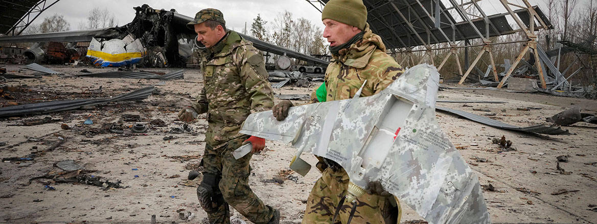 Ukrainian sappers carry a Russian military drone on the outskirts of Kyiv, Ukraine, 18 April 2022. Analysing adversary drones can help the development of appropriate defensive tactics, concepts and doctrine. Courtesy of Associated Press / Alamy